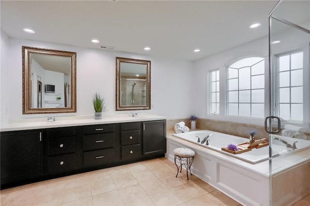4127 Duckhorn Dr, Moon/Crescent Twp, PA 15108 - full bathroom featuring a bath, double vanity, tile patterned flooring, recessed lighting, and an enclosed shower
