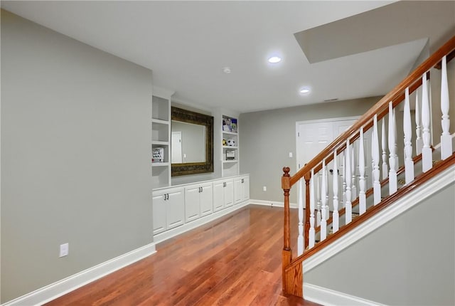 4127 Duckhorn Dr, Moon/Crescent Twp, PA 15108 - stairs with wood finished floors, recessed lighting, and built in features