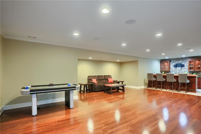 4127 Duckhorn Dr, Moon/Crescent Twp, PA 15108 - playroom with wood finished floors, recessed lighting, and bar area