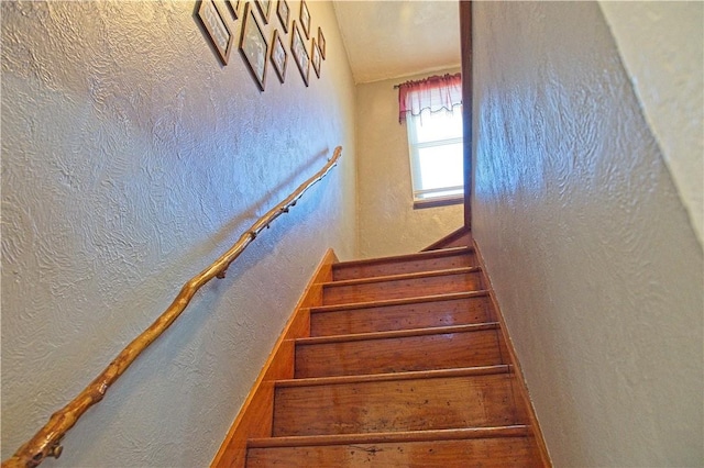 1109 N 2nd St, Jeannette, PA 15644 - staircase featuring a textured wall