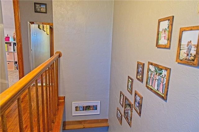 1109 N 2nd St, Jeannette, PA 15644 - staircase with a textured wall