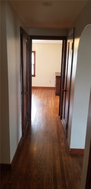 19 Charles St, Dravosburg, PA 15034 - corridor featuring dark wood-style flooring and arched walkways