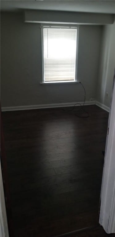 19 Charles St, Dravosburg, PA 15034 - empty room with baseboards and dark wood-style flooring