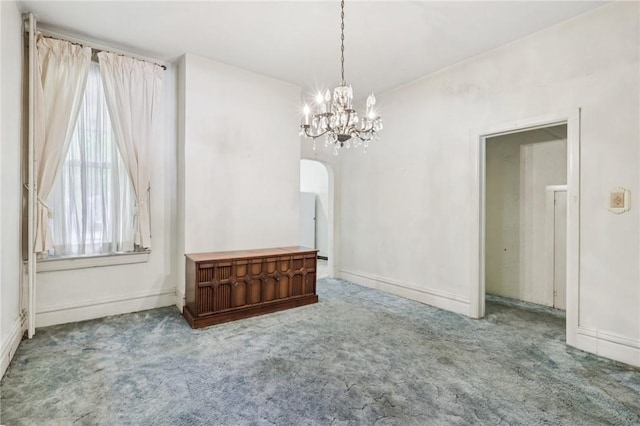 518 N Saint Clair St, East Liberty, PA 15206 - carpeted spare room with a chandelier, plenty of natural light, and arched walkways