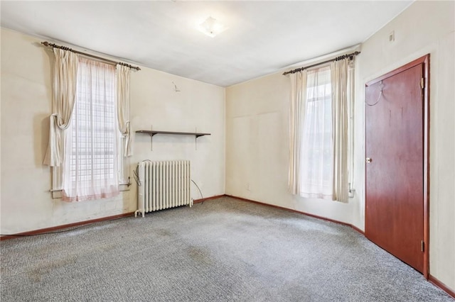 518 N Saint Clair St, East Liberty, PA 15206 - carpeted spare room with radiator and baseboards