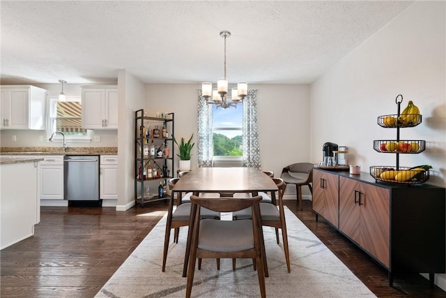 249 Clare Dr, North Strabane, PA 15317 - dining room with a chandelier, plenty of natural light, dark wood-style floors, and a textured ceiling