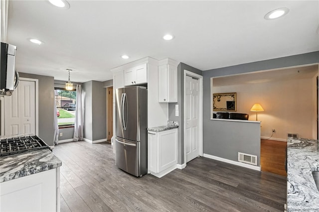 616 Highview Rd, Baldwin Twp, PA 15234 - kitchen featuring freestanding refrigerator, dark wood-type flooring, white cabinets, recessed lighting, and light stone countertops