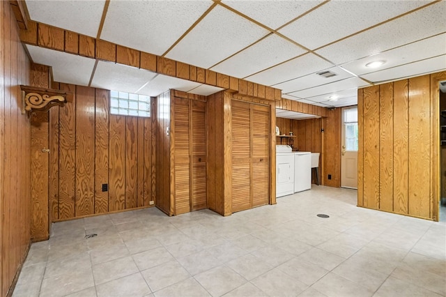 616 Highview Rd, Baldwin Twp, PA 15234 - basement with wood walls, washer / dryer, and healthy amount of natural light