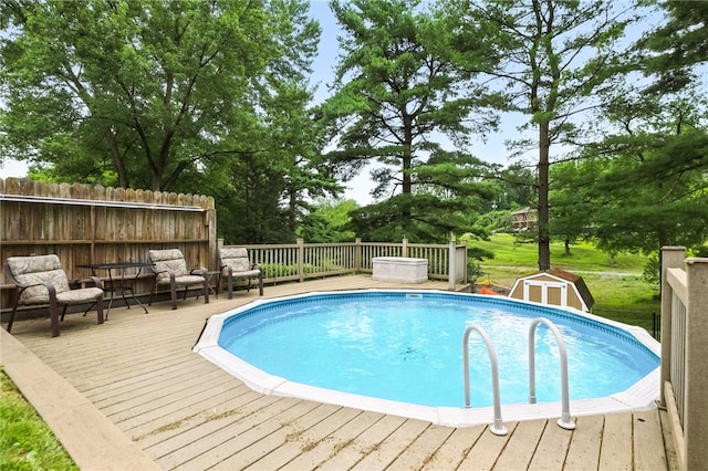 616 Highview Rd, Baldwin Twp, PA 15234 - view of swimming pool with a deck and a storage shed