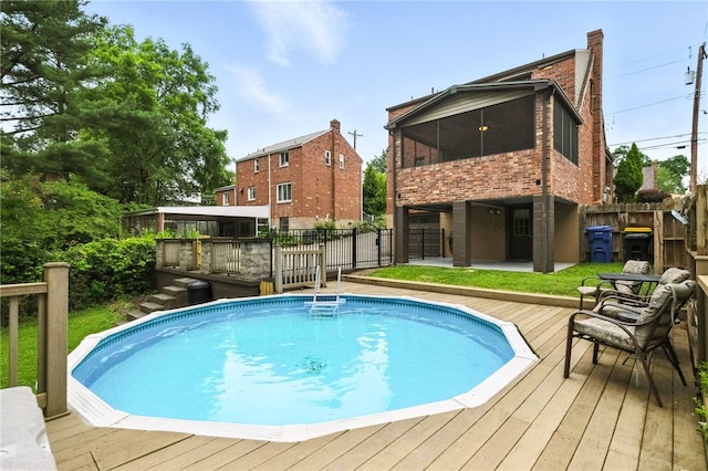 616 Highview Rd, Baldwin Twp, PA 15234 - swimming pool featuring a deck and a sunroom