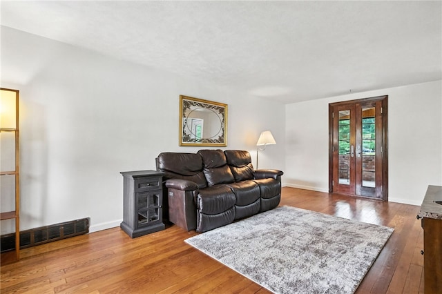 616 Highview Rd, Baldwin Twp, PA 15234 - living area with hardwood / wood-style flooring and a wood stove
