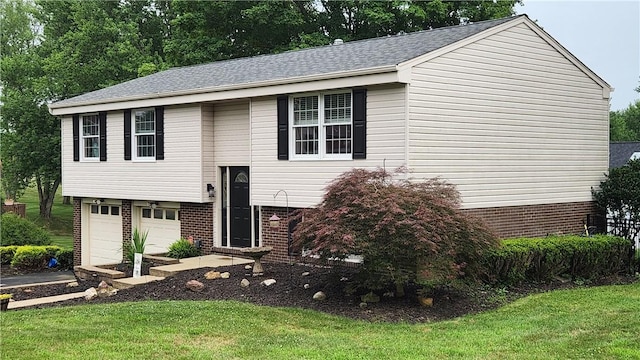 2583 Richard Rd, Franklin Park, PA 15090 - raised ranch with brick siding, an attached garage, driveway, and a front lawn