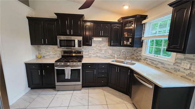 2583 Richard Rd, Franklin Park, PA 15090 - kitchen featuring appliances with stainless steel finishes, light marble finish floors, light countertops, and vaulted ceiling