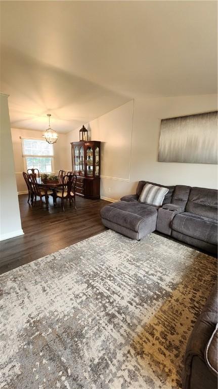 2583 Richard Rd, Franklin Park, PA 15090 - living room featuring dark wood finished floors and a chandelier