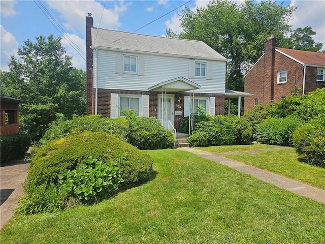 3842 Greensburg Pike, Forest Hills Boro, PA 15221 - view of front of property featuring brick siding, a chimney, and a front lawn