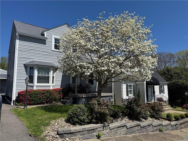 1009 Roselawn Ave, Harmony Twp, PA 15003 - view of front of home with roof with shingles