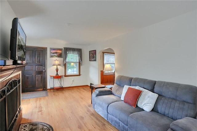 1009 Roselawn Ave, Harmony Twp, PA 15003 - living area featuring light wood-style flooring and arched walkways