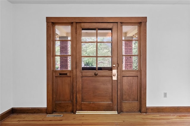 208 E 19th Ave, Munhall, PA 15120 - doorway featuring wood finished floors
