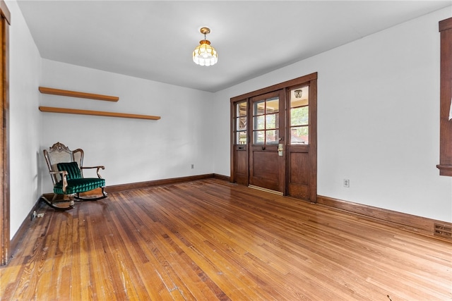 208 E 19th Ave, Munhall, PA 15120 - entrance foyer featuring hardwood / wood-style floors and baseboards