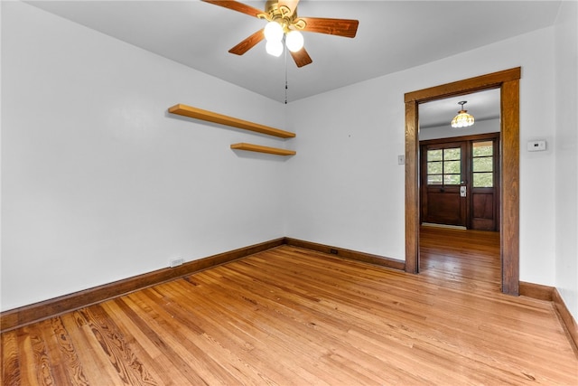 208 E 19th Ave, Munhall, PA 15120 - unfurnished room with light wood-type flooring and ceiling fan