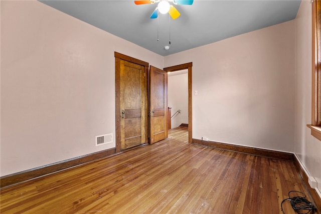 208 E 19th Ave, Munhall, PA 15120 - empty room with hardwood / wood-style flooring and a ceiling fan