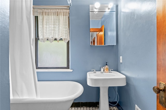 208 E 19th Ave, Munhall, PA 15120 - bathroom featuring a freestanding tub