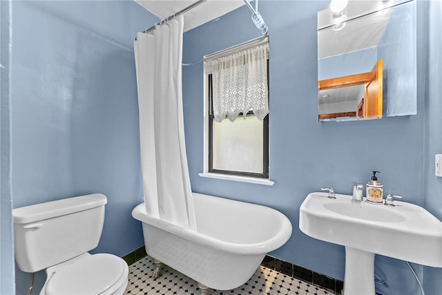 208 E 19th Ave, Munhall, PA 15120 - bathroom featuring a soaking tub, tile patterned floors, and curtained shower