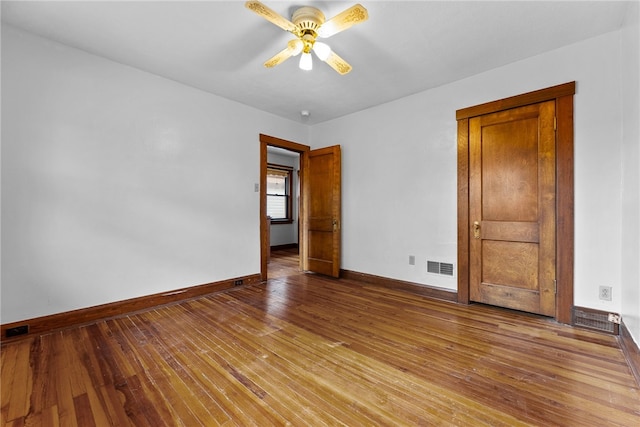 208 E 19th Ave, Munhall, PA 15120 - empty room with a ceiling fan and hardwood / wood-style floors