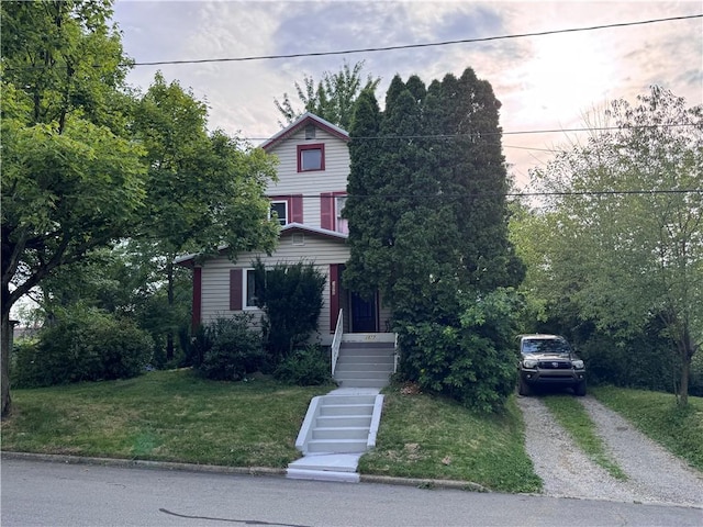 1077 Bechtol Ave, Sharon, PA 16146 - view of property hidden behind natural elements with driveway and a front lawn