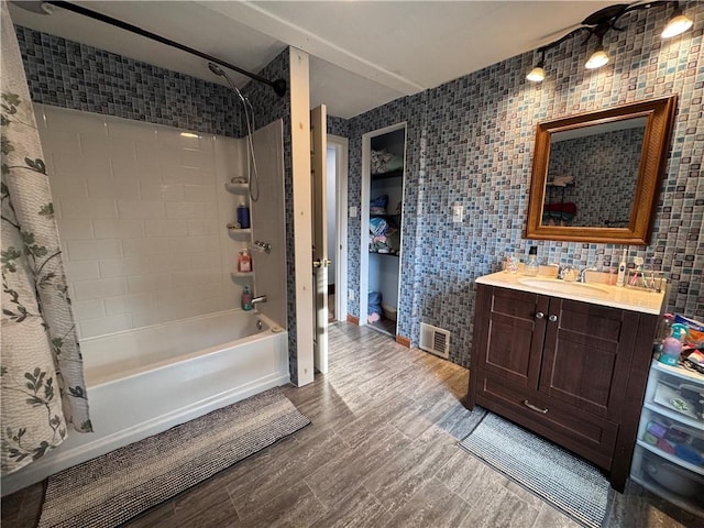 1077 Bechtol Ave, Sharon, PA 16146 - bathroom featuring shower / tub combo, vanity, wood finished floors, and tile walls