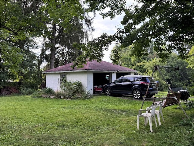 1077 Bechtol Ave, Sharon, PA 16146 - view of side of home featuring a lawn and concrete block siding