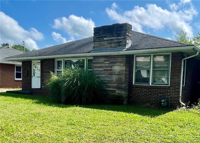 408 Ekin St, Elizabeth Twp/Boro, PA 15037 - view of home's exterior with a yard, roof with shingles, brick siding, and stone siding