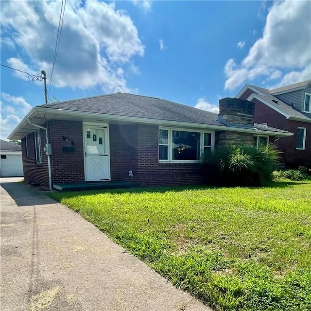 408 Ekin St, Elizabeth Twp/Boro, PA 15037 - view of front of house featuring a front lawn and brick siding