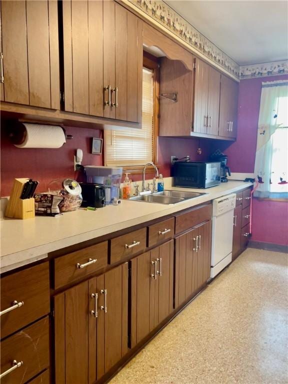 408 Ekin St, Elizabeth Twp/Boro, PA 15037 - kitchen with dishwasher, black microwave, light countertops, and brown cabinetry