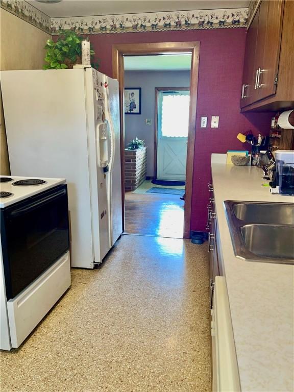 408 Ekin St, Elizabeth Twp/Boro, PA 15037 - kitchen featuring white appliances and light countertops