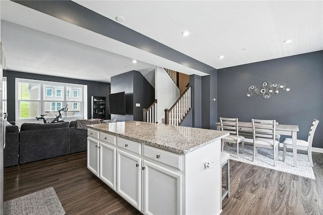4022 Crown Dr, South Park, PA 15129 - kitchen with dark wood finished floors, white cabinetry, open floor plan, a kitchen island, and recessed lighting
