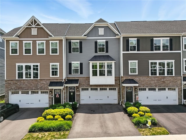 4022 Crown Dr, South Park, PA 15129 - view of property with stone siding, board and batten siding, and driveway