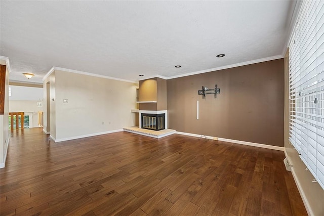 2692 Hunters Point Dr, Franklin Park, PA 15090 - unfurnished living room with a multi sided fireplace, dark wood-style flooring, ornamental molding, and recessed lighting