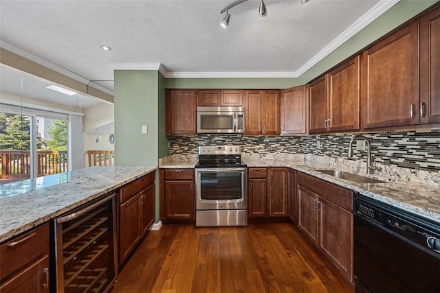 2692 Hunters Point Dr, Franklin Park, PA 15090 - kitchen featuring beverage cooler, appliances with stainless steel finishes, dark wood-type flooring, light stone counters, and crown molding