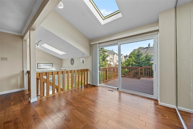 2692 Hunters Point Dr, Franklin Park, PA 15090 - spare room featuring a skylight and wood finished floors