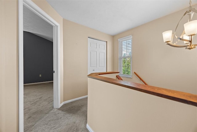 2692 Hunters Point Dr, Franklin Park, PA 15090 - corridor with light carpet, a chandelier, and an upstairs landing