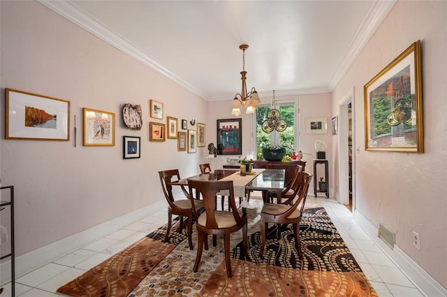 303 Schenley Rd, Squirrel Hill, PA 15217 - dining space featuring ornamental molding and a chandelier