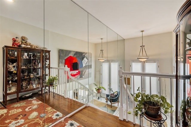 303 Schenley Rd, Squirrel Hill, PA 15217 - corridor with wood finished floors and an upstairs landing