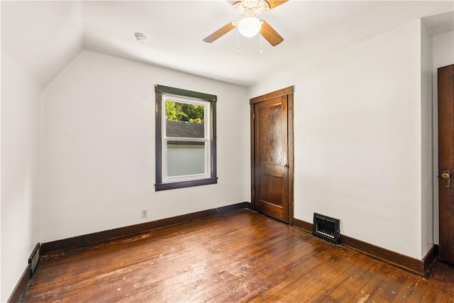 1307 Wade St, Aliquippa, PA 15001 - unfurnished bedroom featuring dark wood finished floors, vaulted ceiling, and a ceiling fan