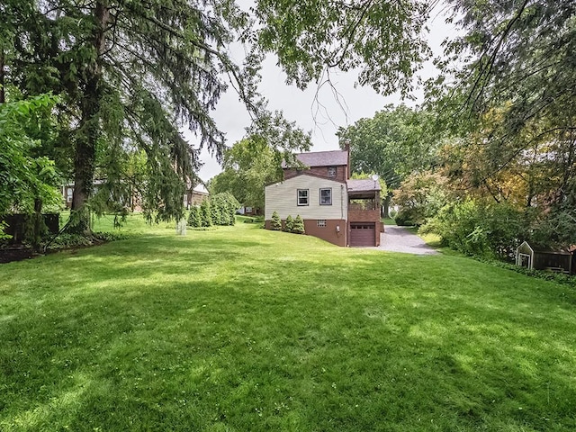 1907 Shaler Dr, Shaler, PA 15116 - view of green lawn featuring a garage