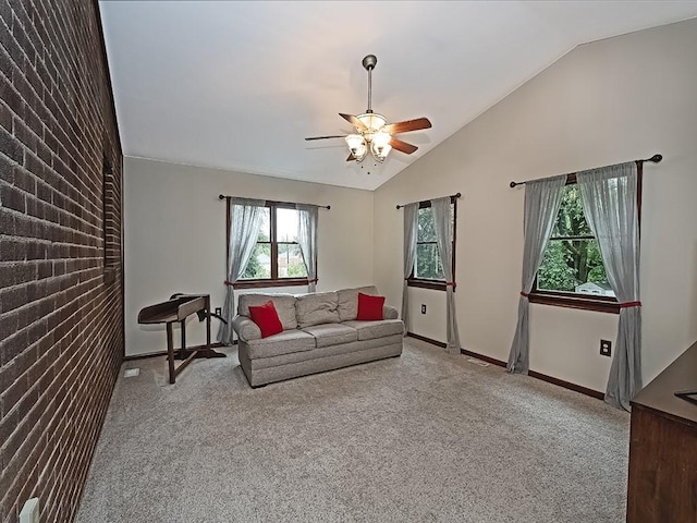 1907 Shaler Dr, Shaler, PA 15116 - living area with lofted ceiling, carpet flooring, ceiling fan, and brick wall