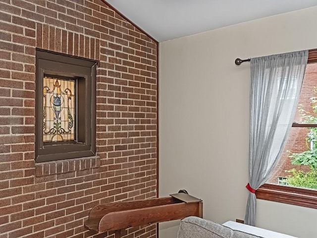 1907 Shaler Dr, Shaler, PA 15116 - interior space featuring lofted ceiling and brick wall