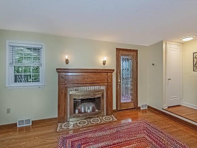 1907 Shaler Dr, Shaler, PA 15116 - unfurnished living room with wood finished floors and a fireplace with flush hearth