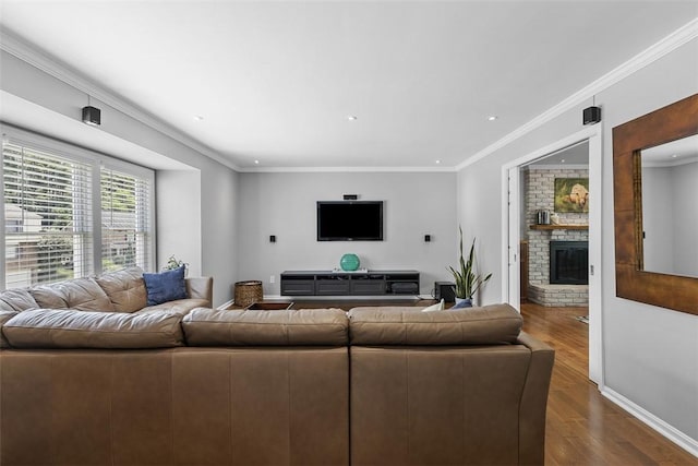 108 Oak Pointe Dr, Monroeville, PA 15146 - living room with dark wood finished floors, a brick fireplace, ornamental molding, and recessed lighting