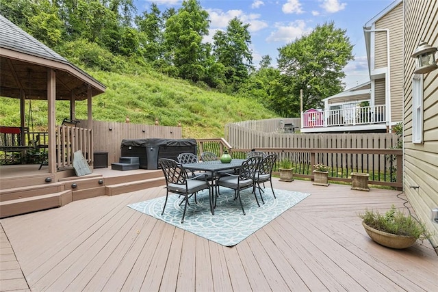 108 Oak Pointe Dr, Monroeville, PA 15146 - wooden deck with a hot tub and outdoor dining space